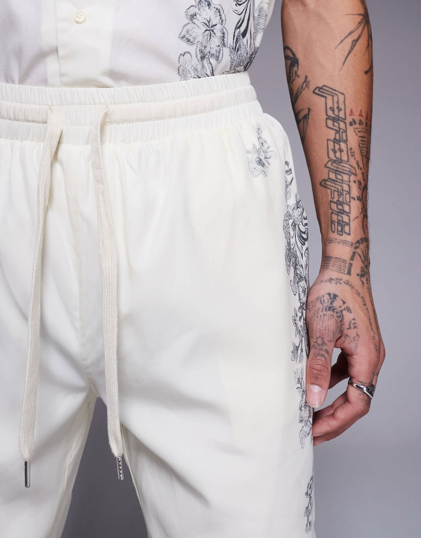 Liquor N Poker royal emblem print motif shorts co-ord in off white