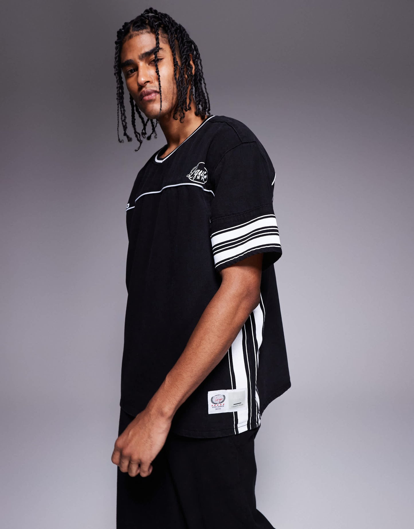 Liquor N Poker overszied varsity hockey t-shirt in black