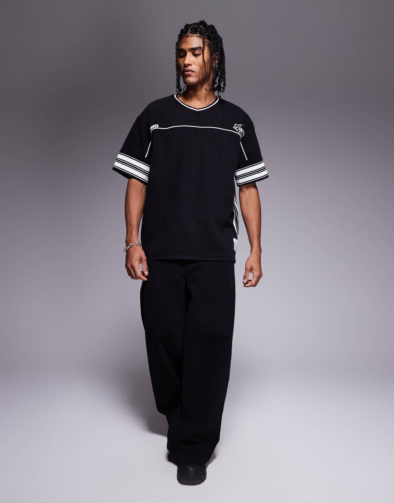 Liquor N Poker overszied varsity hockey t-shirt in black