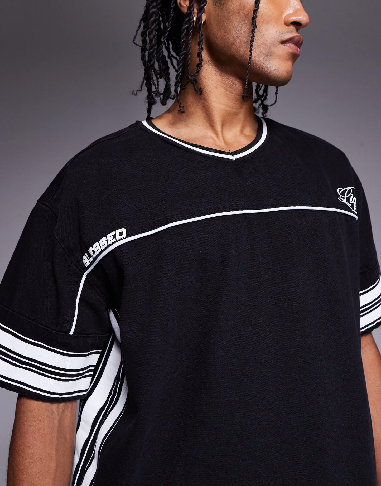 Liquor N Poker overszied varsity hockey t-shirt in black