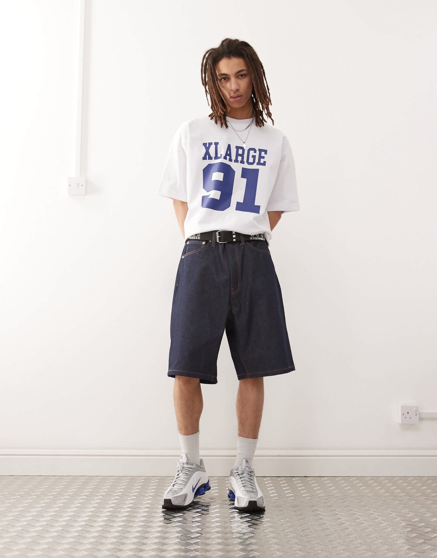XLARGE baggy jorts with back pocket OG logo embroidery in rinse