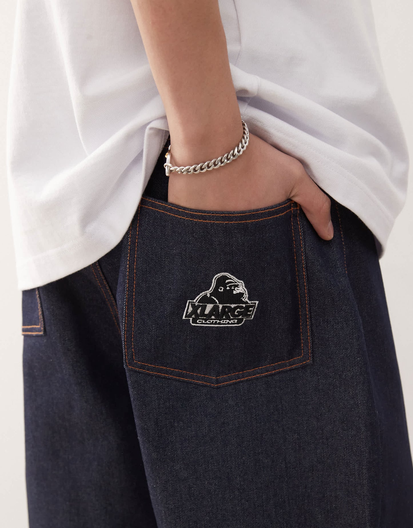 XLARGE baggy jorts with back pocket OG logo embroidery in rinse