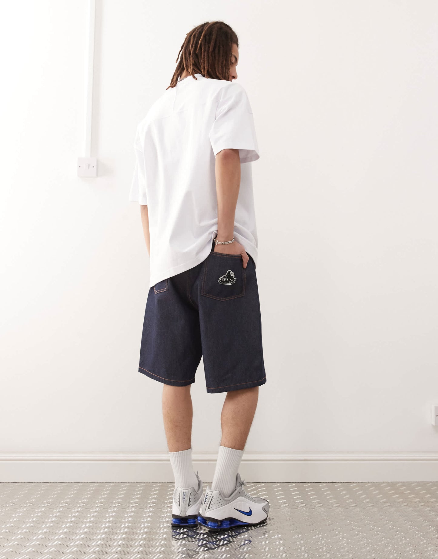 XLARGE baggy jorts with back pocket OG logo embroidery in rinse