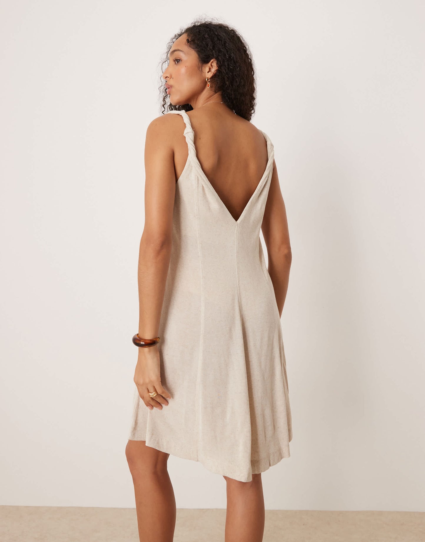 ASOS DESIGN linen look sleeveless tennis mini dress is cream
