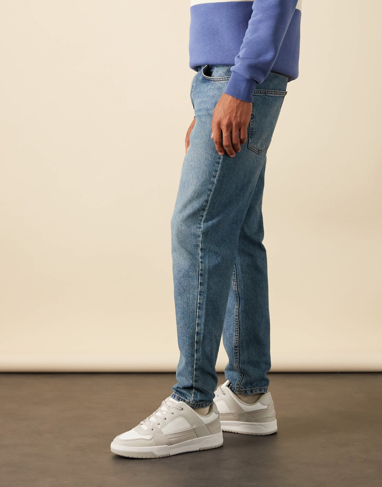 ASOS DESIGN tapered jeans in mid wash blue