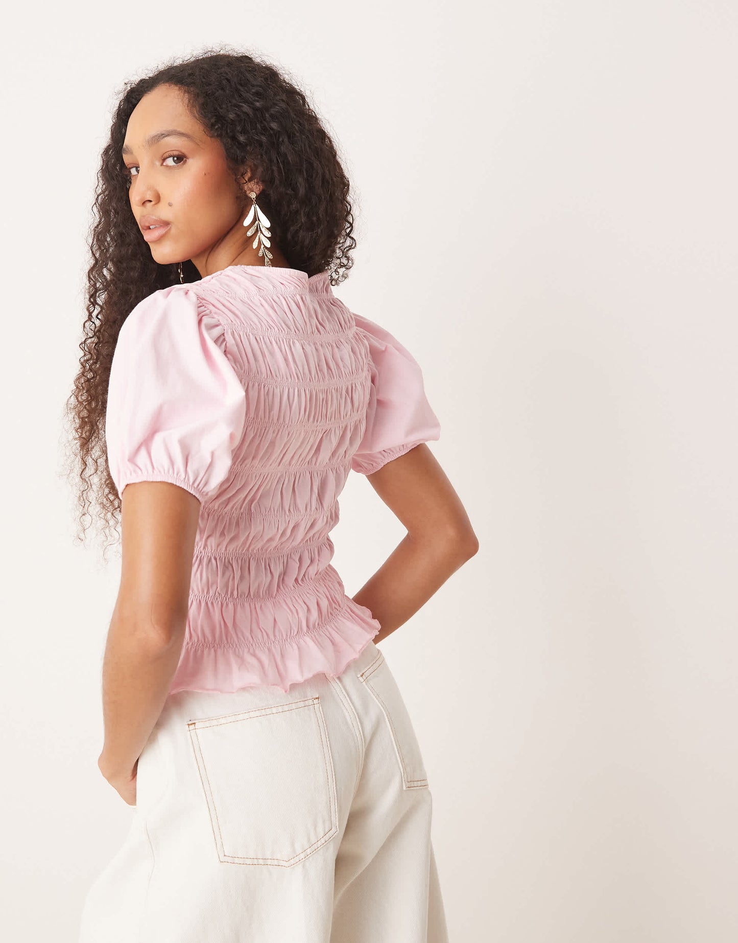 ASOS DESIGN cotton shirred top with frill peplum and puff sleeve in baby pink