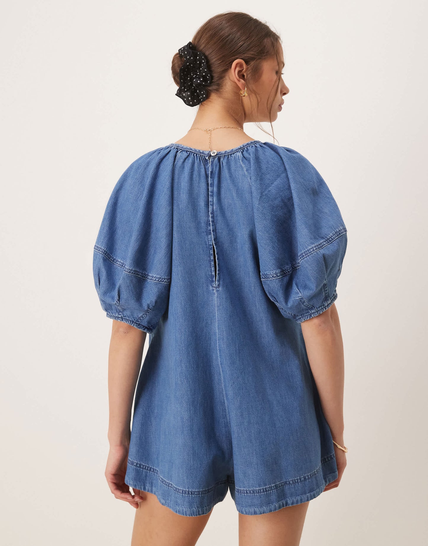 ASOS DESIGN soft denim playsuit with balloon sleeves in midwash blue