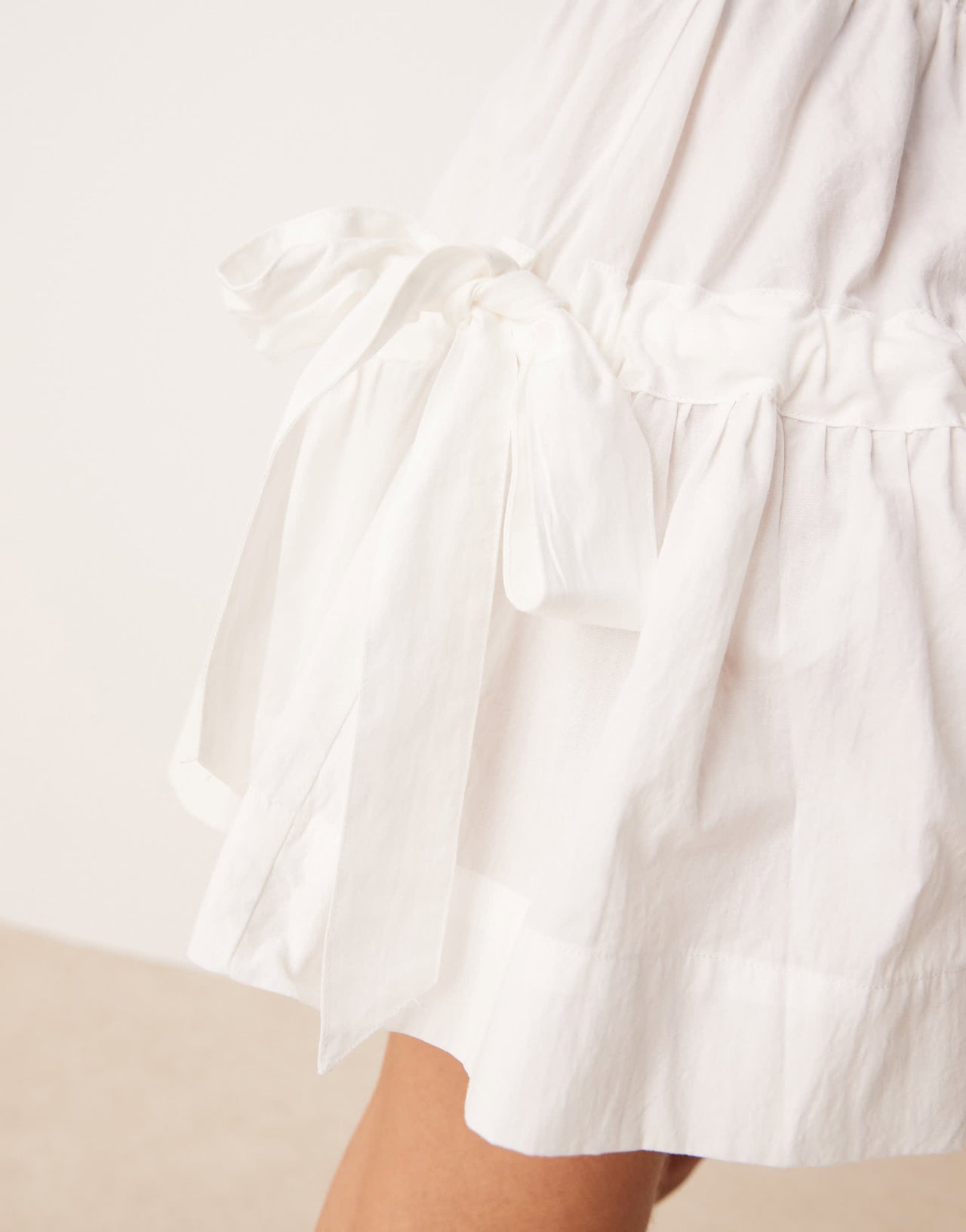 VRG GRL pleated mini skirt in white
