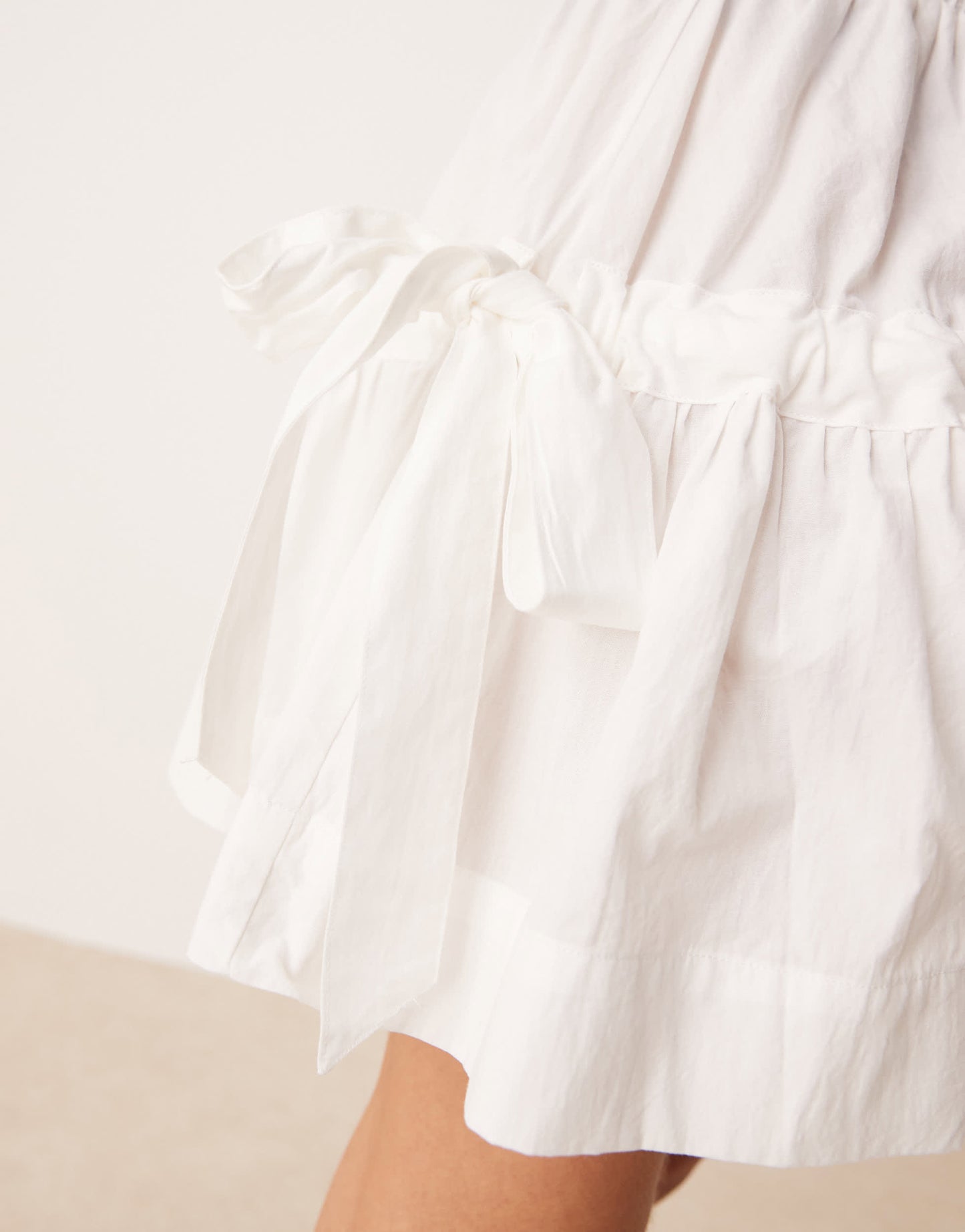 VRG GRL pleated mini skirt in white