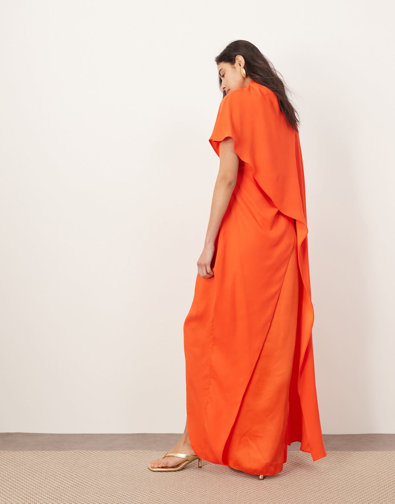 ARRANGE asymmetric caped maxi dress in red