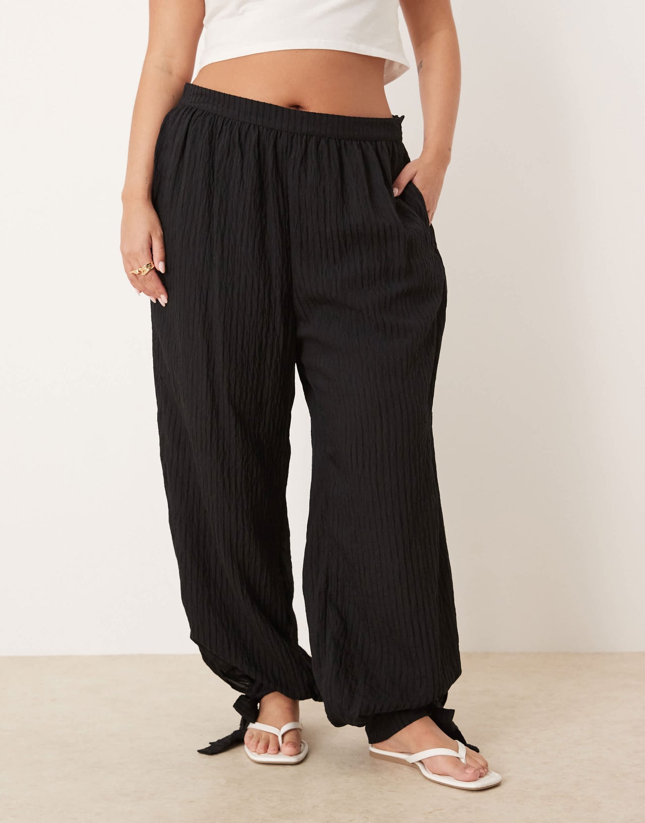 ASOS DESIGN Curve textured stripe billow trousers with cuff detail in black