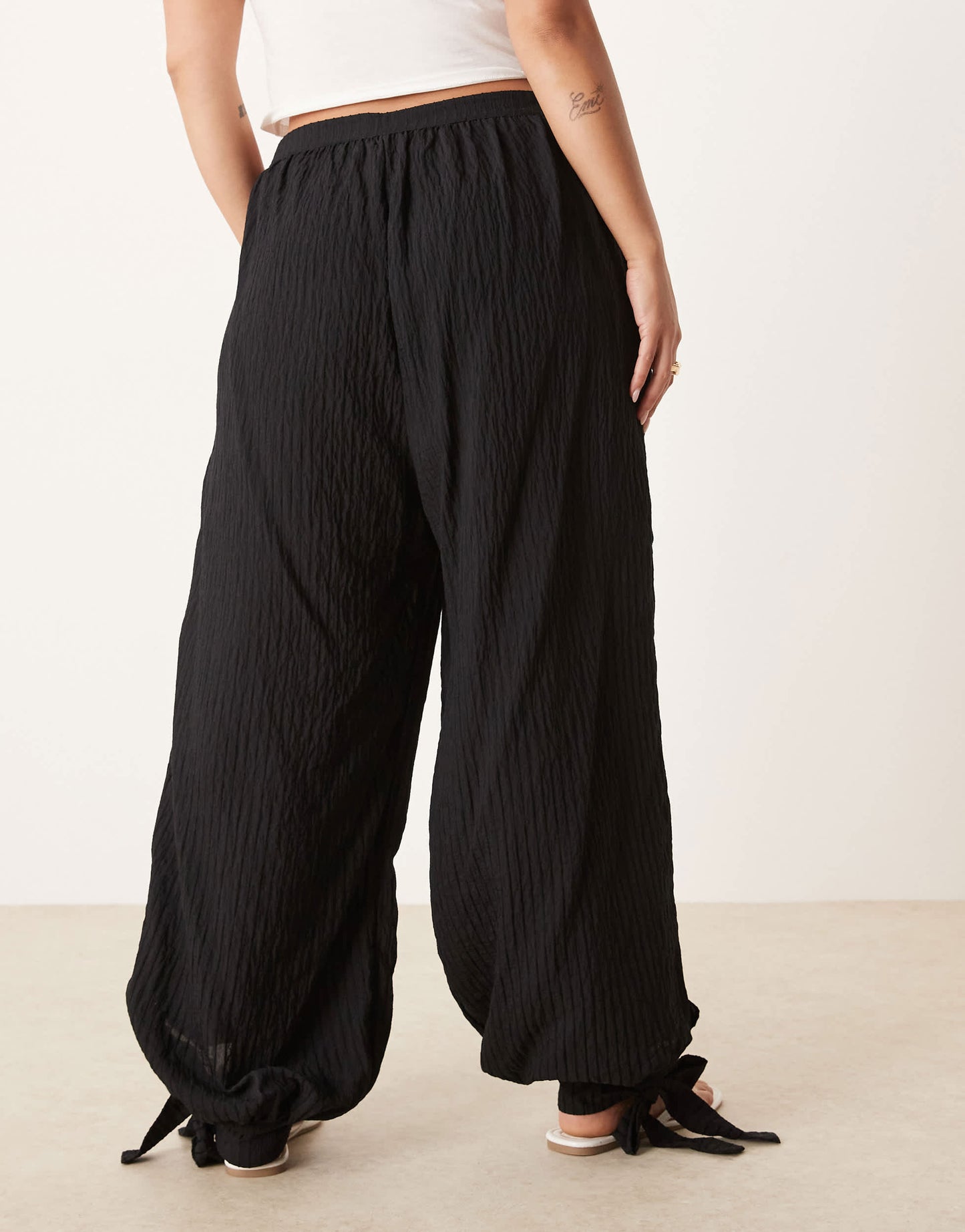 ASOS DESIGN Curve textured stripe billow trousers with cuff detail in black