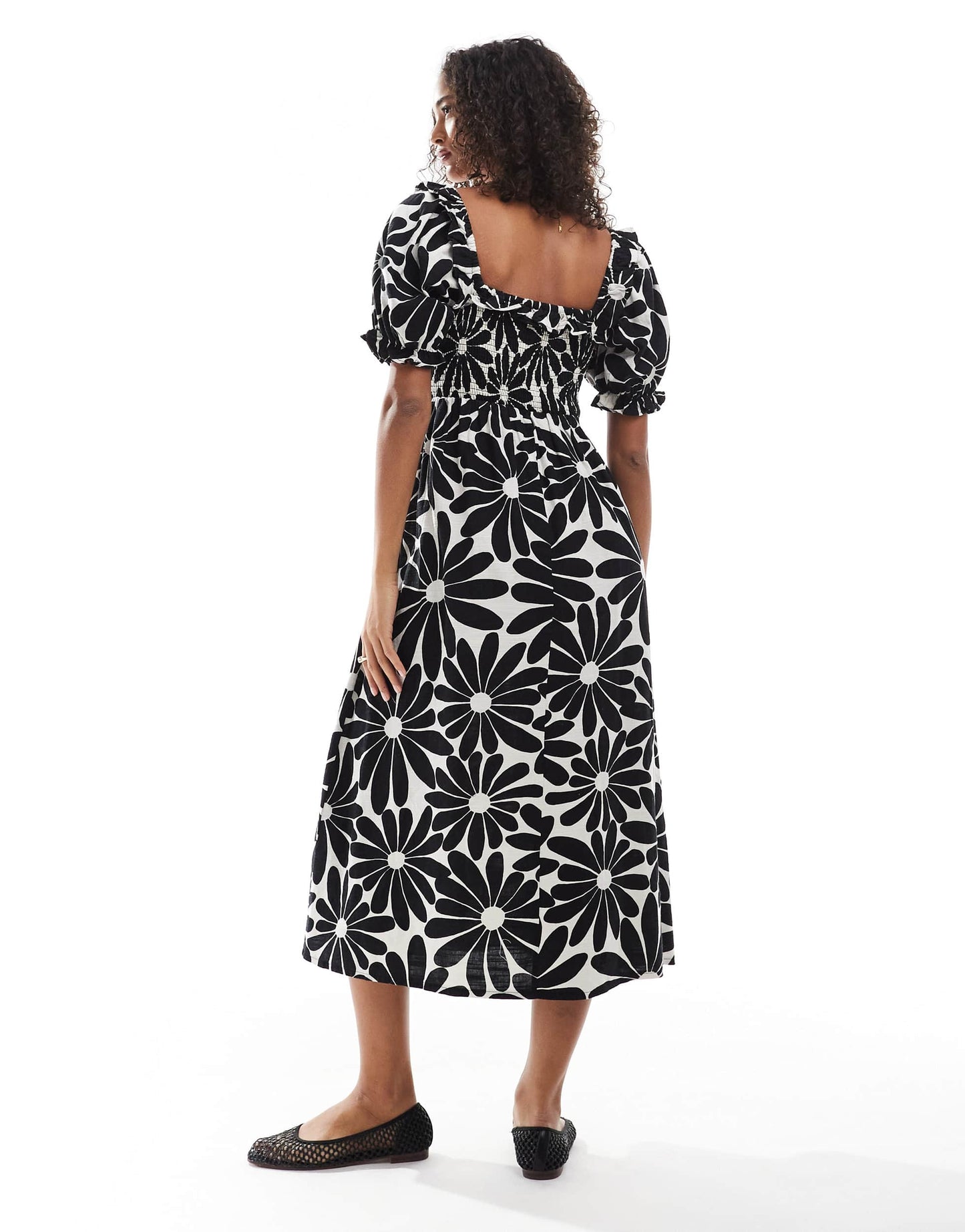 New Look puff sleeve milkmaid dress in black floral print