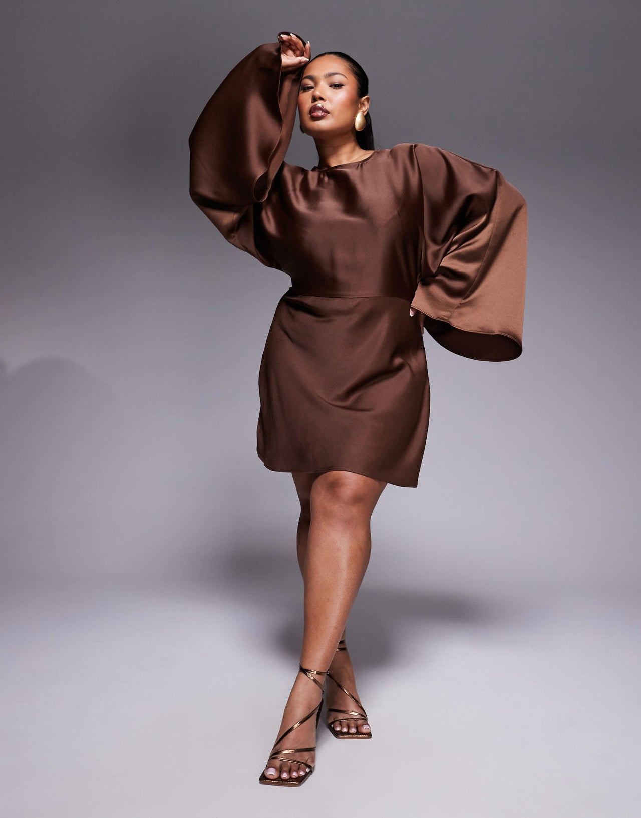 ASOS DESIGN Curve structured batwing playsuit with skort detail in chocolate