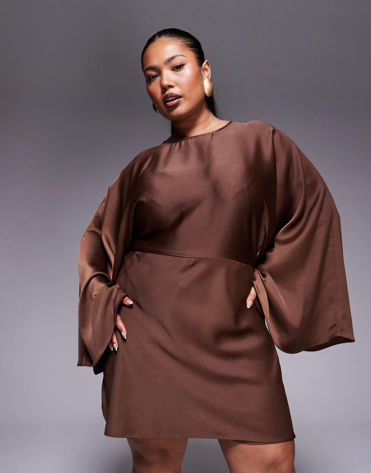 ASOS DESIGN Curve structured batwing playsuit with skort detail in chocolate
