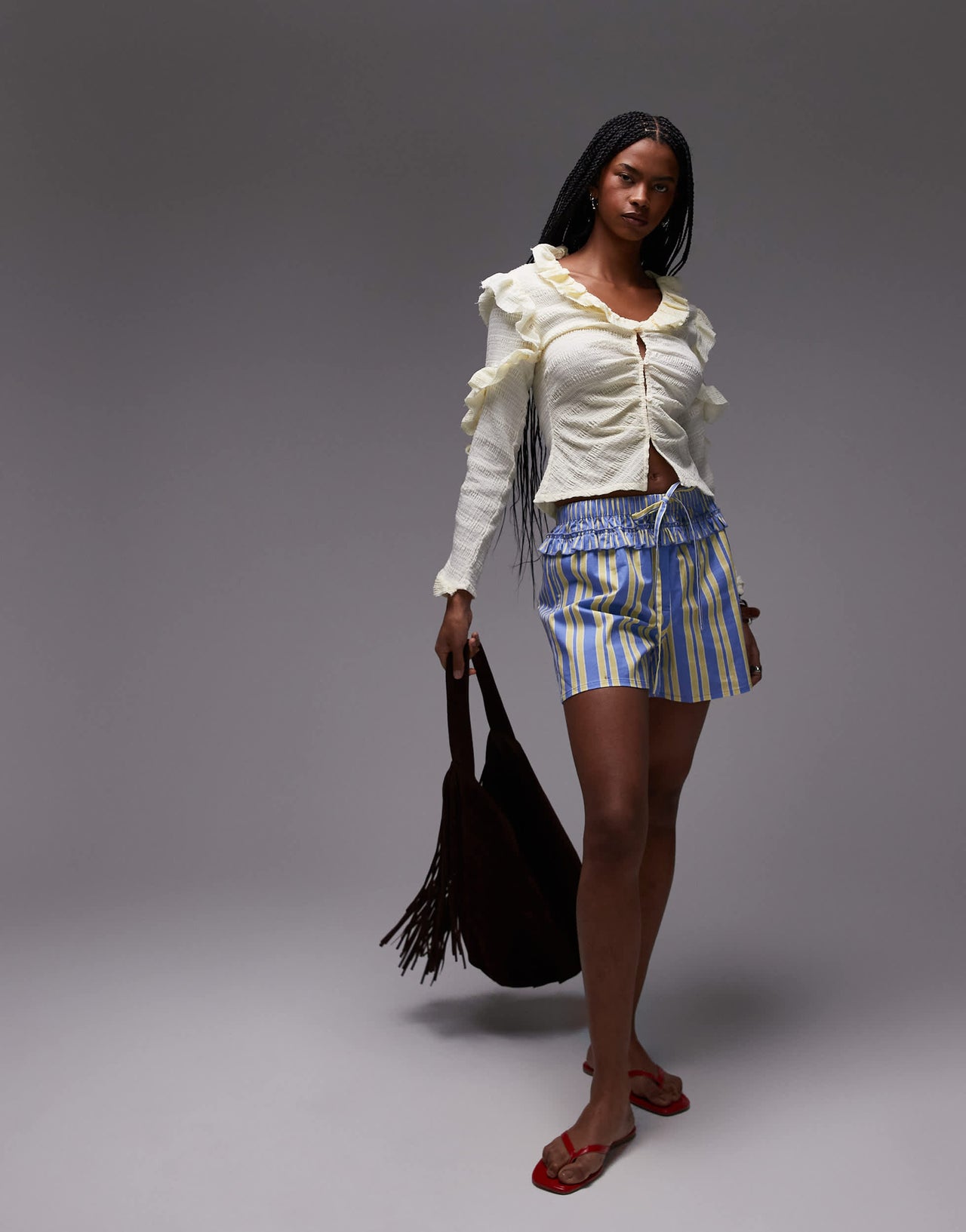 LAAGAM textured ruffle front button up blouse in white
