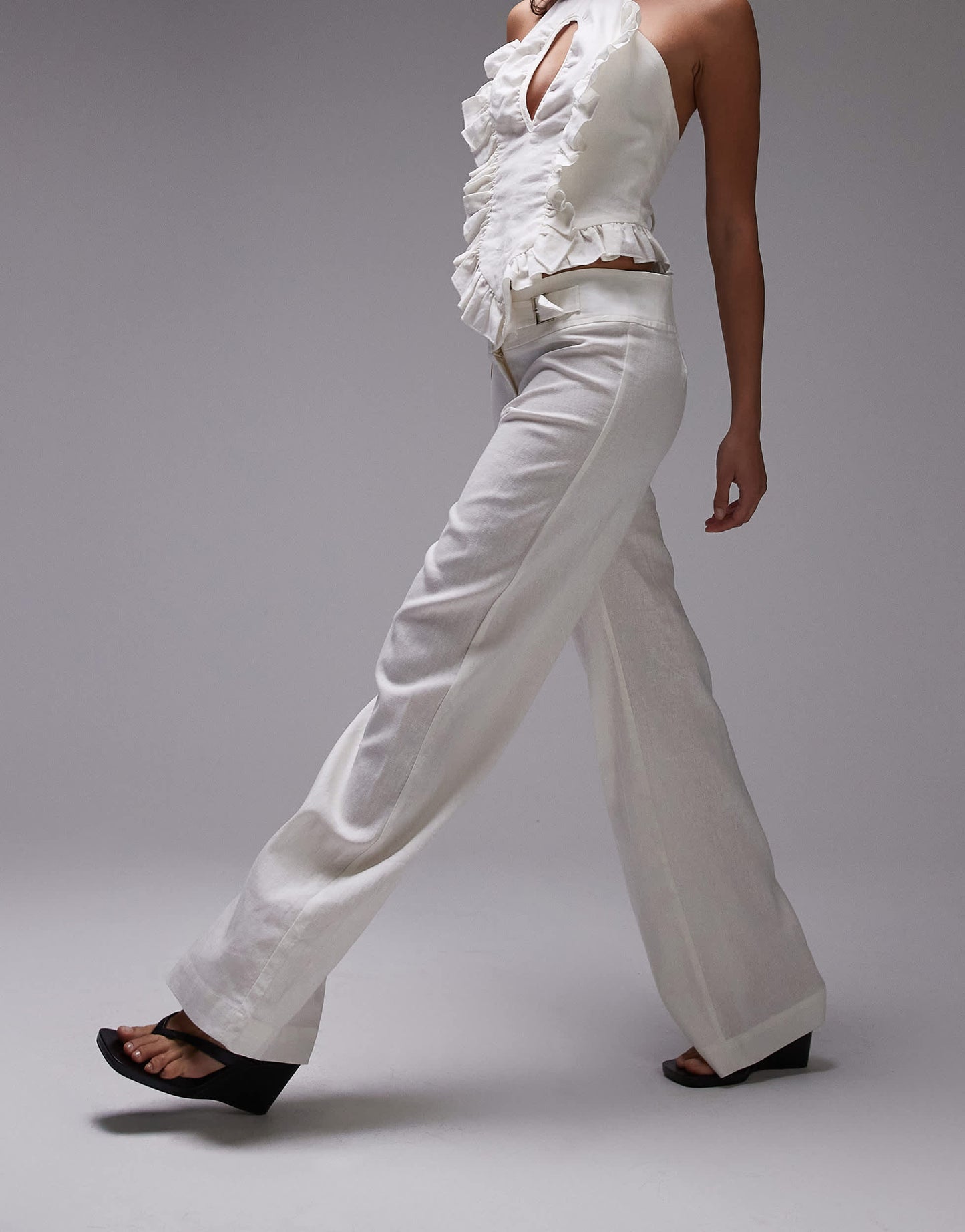 LAAGAM kaine linen trousers with silver buckle in white co-ord