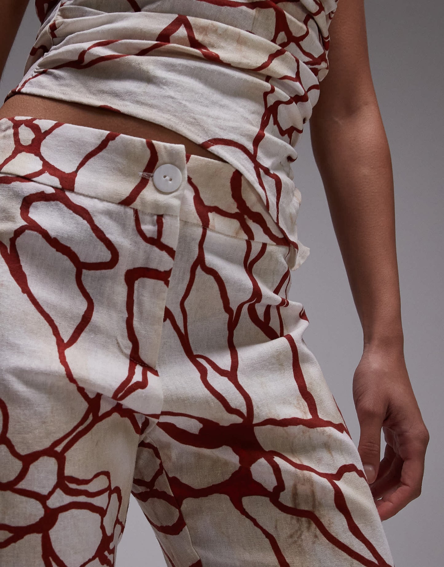 LAAGAM marble linen trousers with red abstract print co-ord