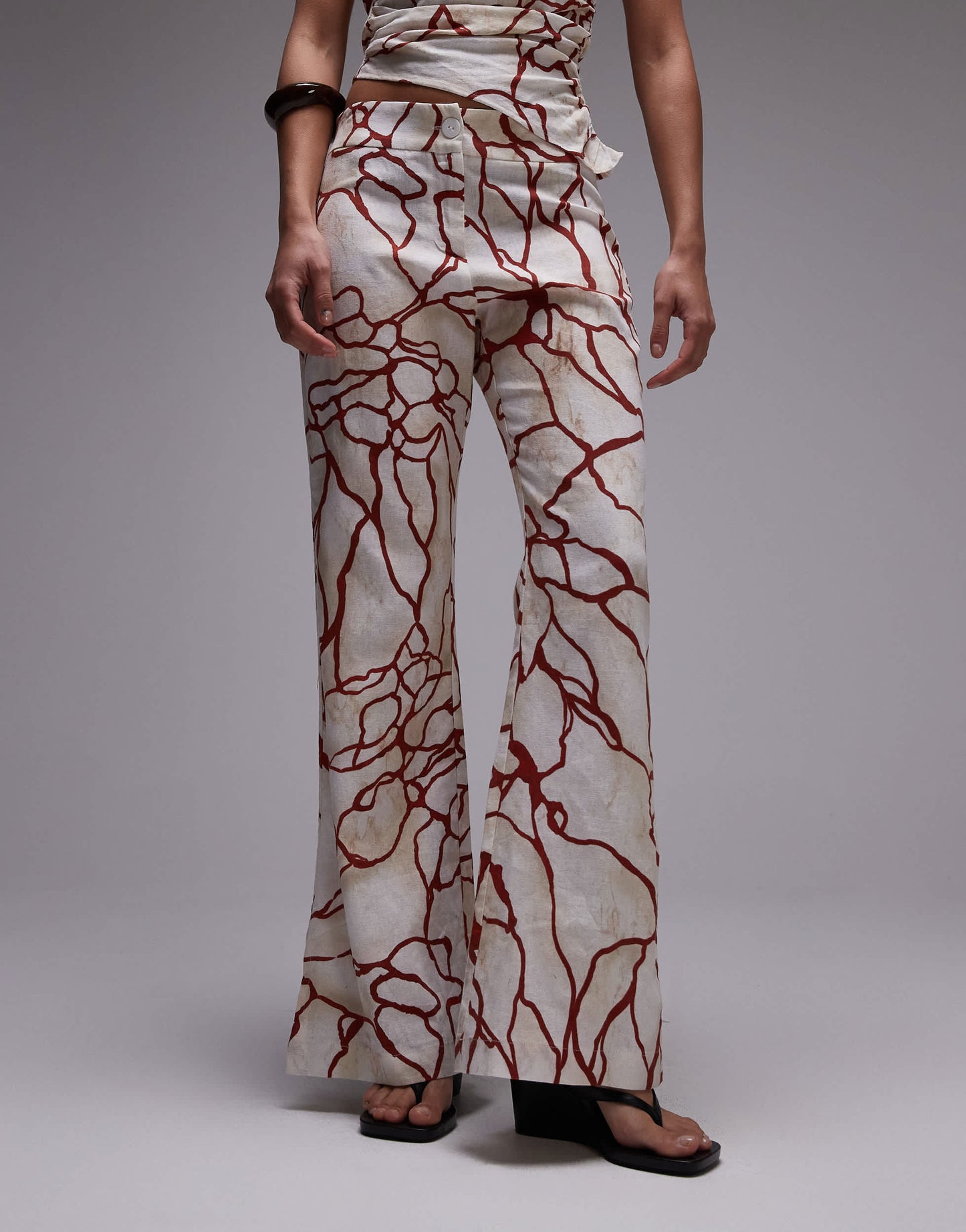 LAAGAM marble linen trousers with red abstract print co-ord