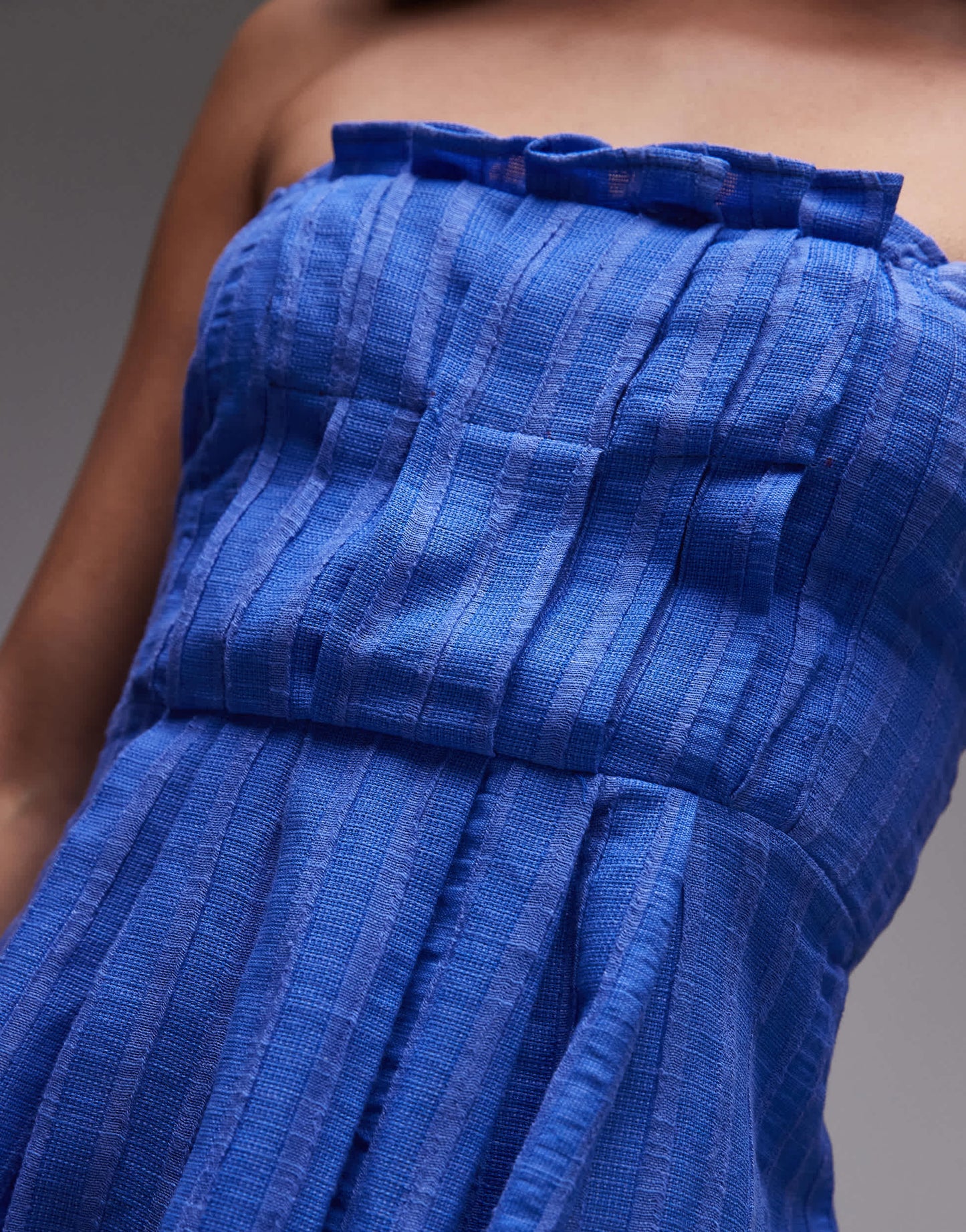 LAAGAM ewan strapless textured top in blue