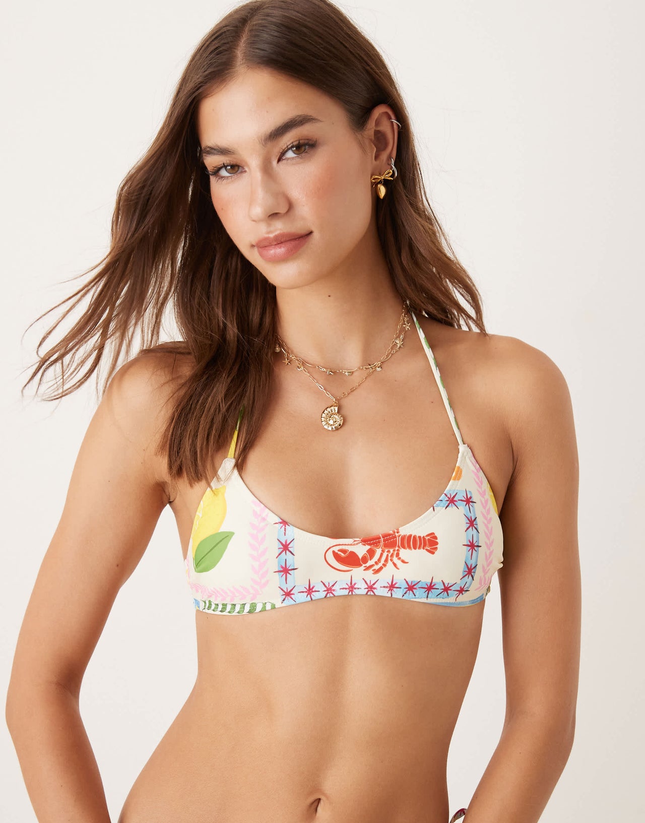 ASOS DESIGN Olive Antibes halter bikini top in tile print