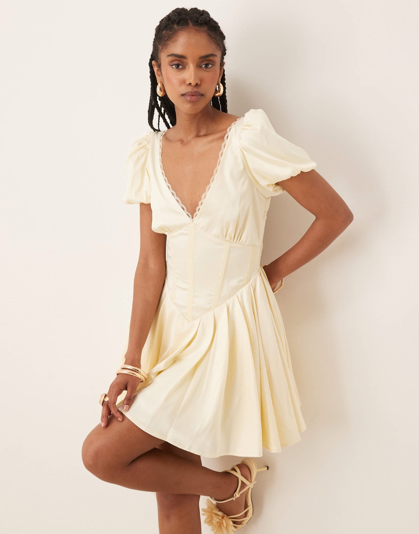 Lace & Beads puff sleeve satin corset mini dress in butter yellow