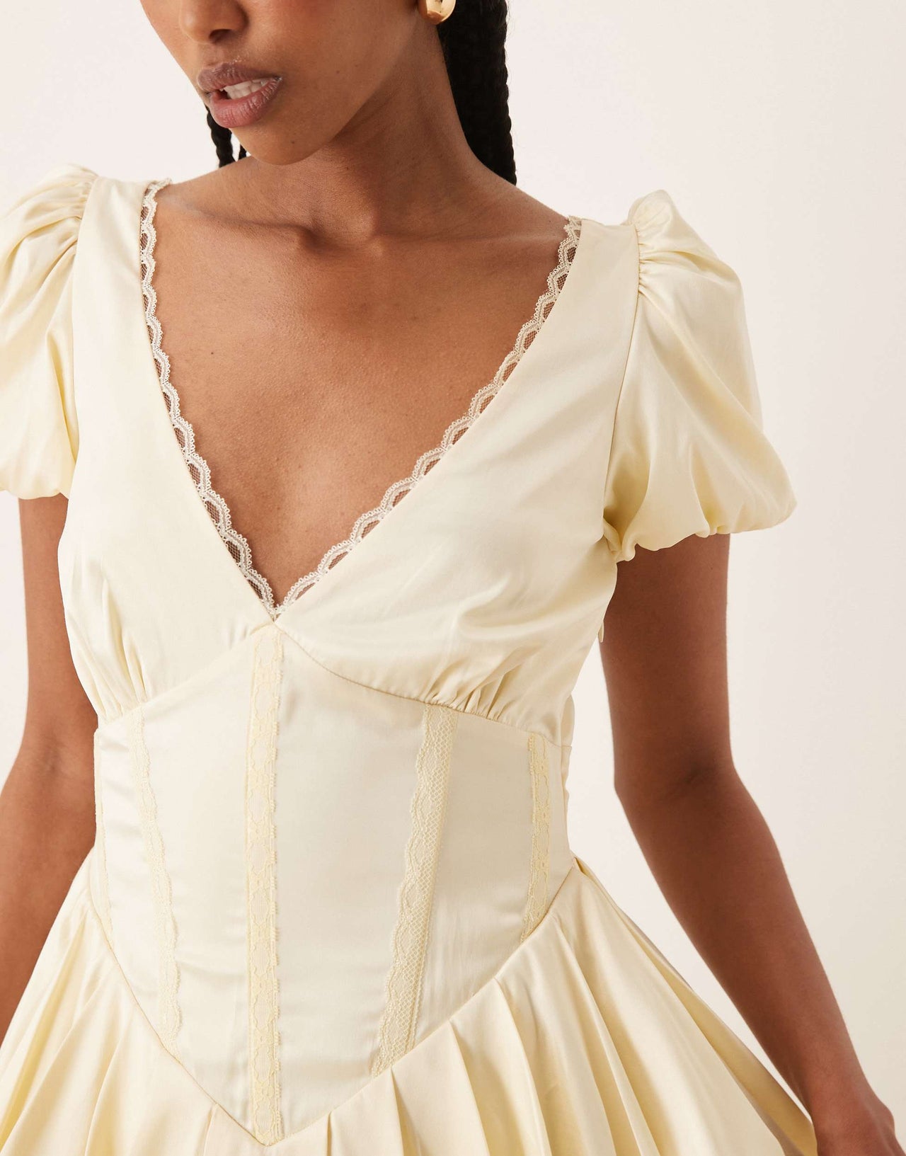 Lace & Beads puff sleeve satin corset mini dress in butter yellow