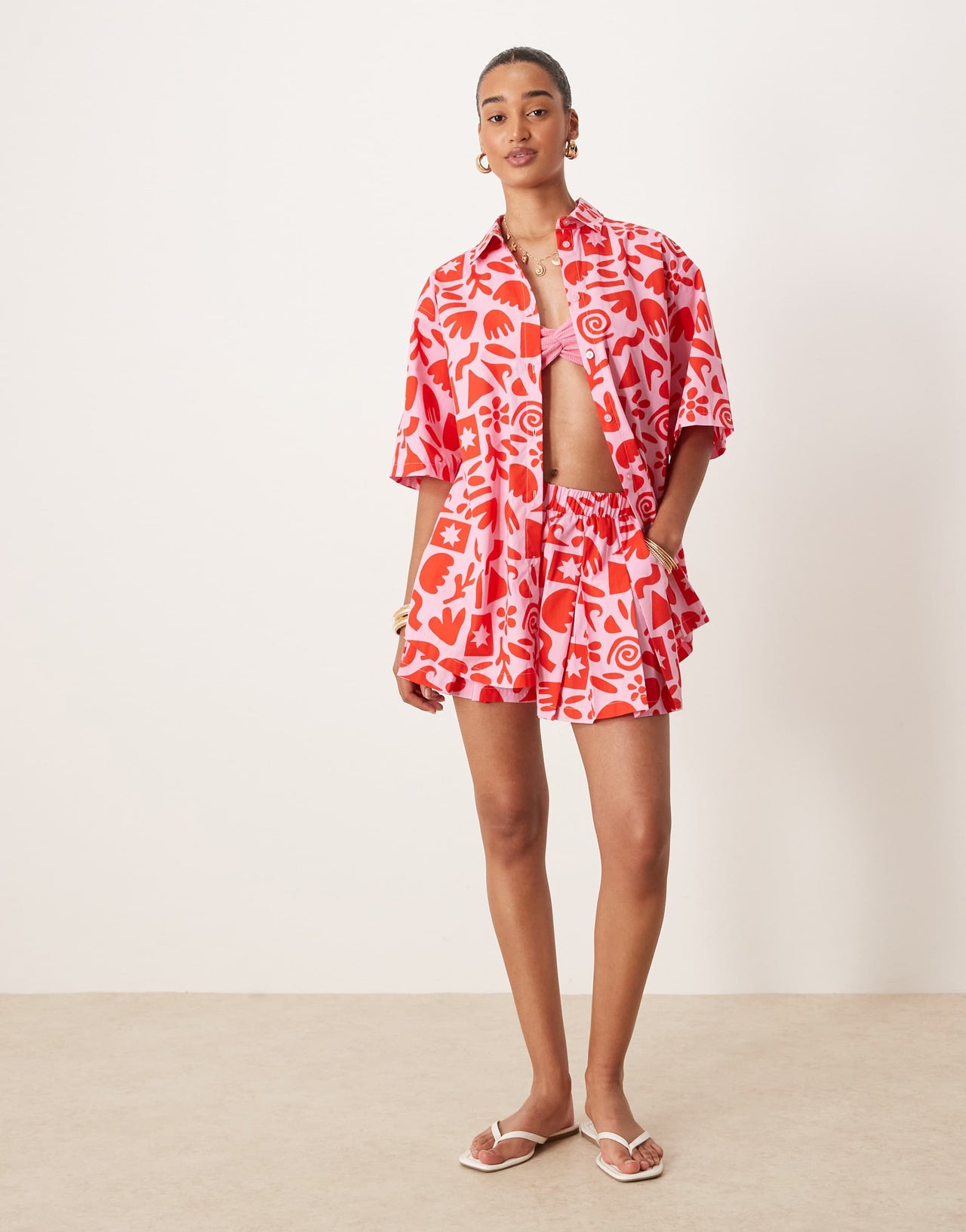 ASOS DESIGN pull on flippy shorts co-ord with pleat detail in arty print