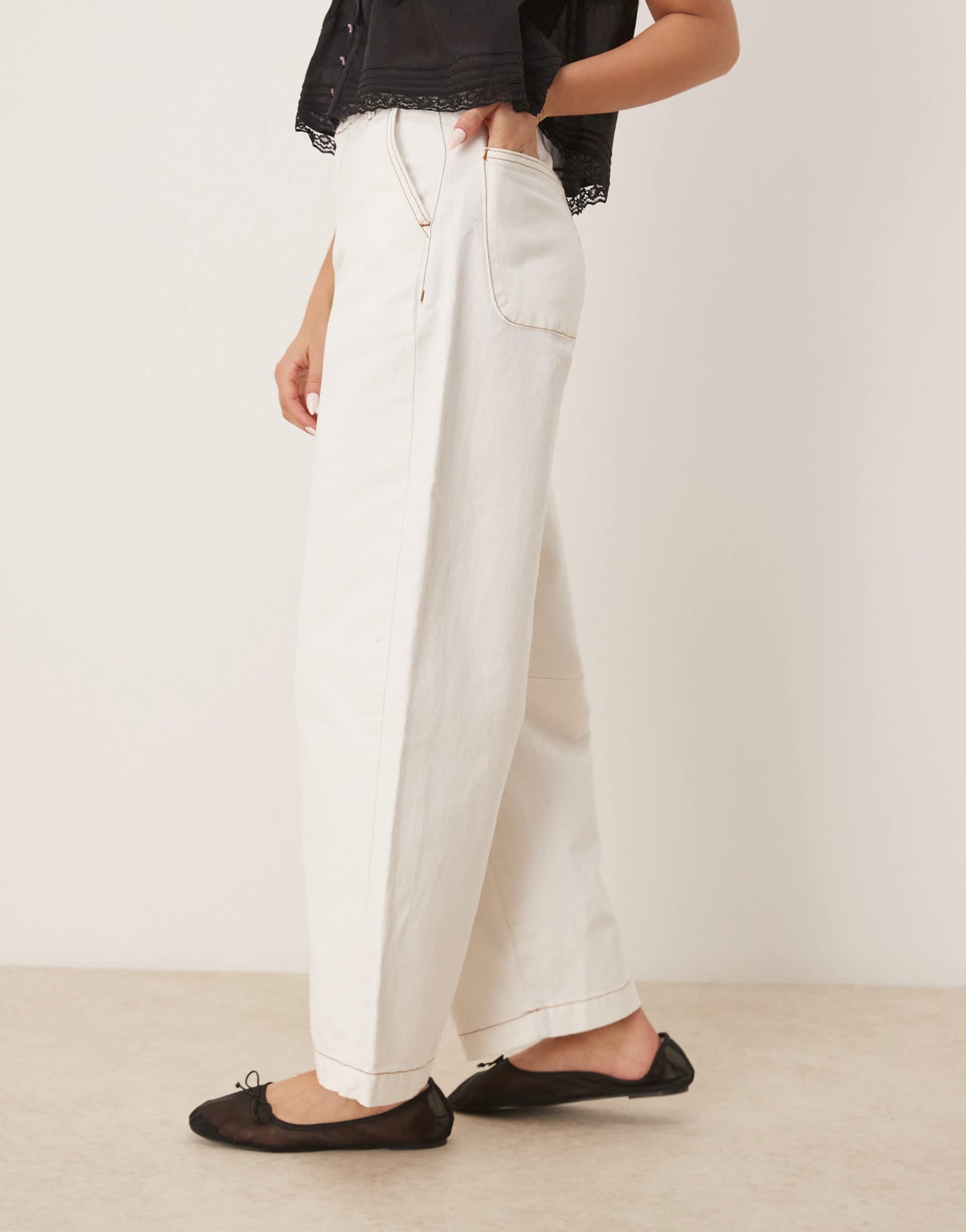 ASOS DESIGN denim arch leg trousers in ecru