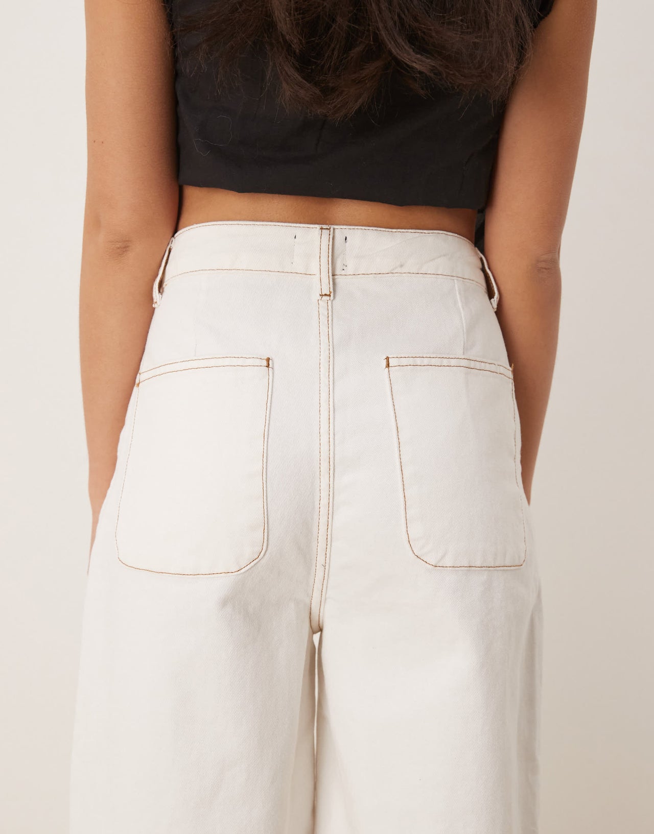 ASOS DESIGN denim arch leg trousers in ecru