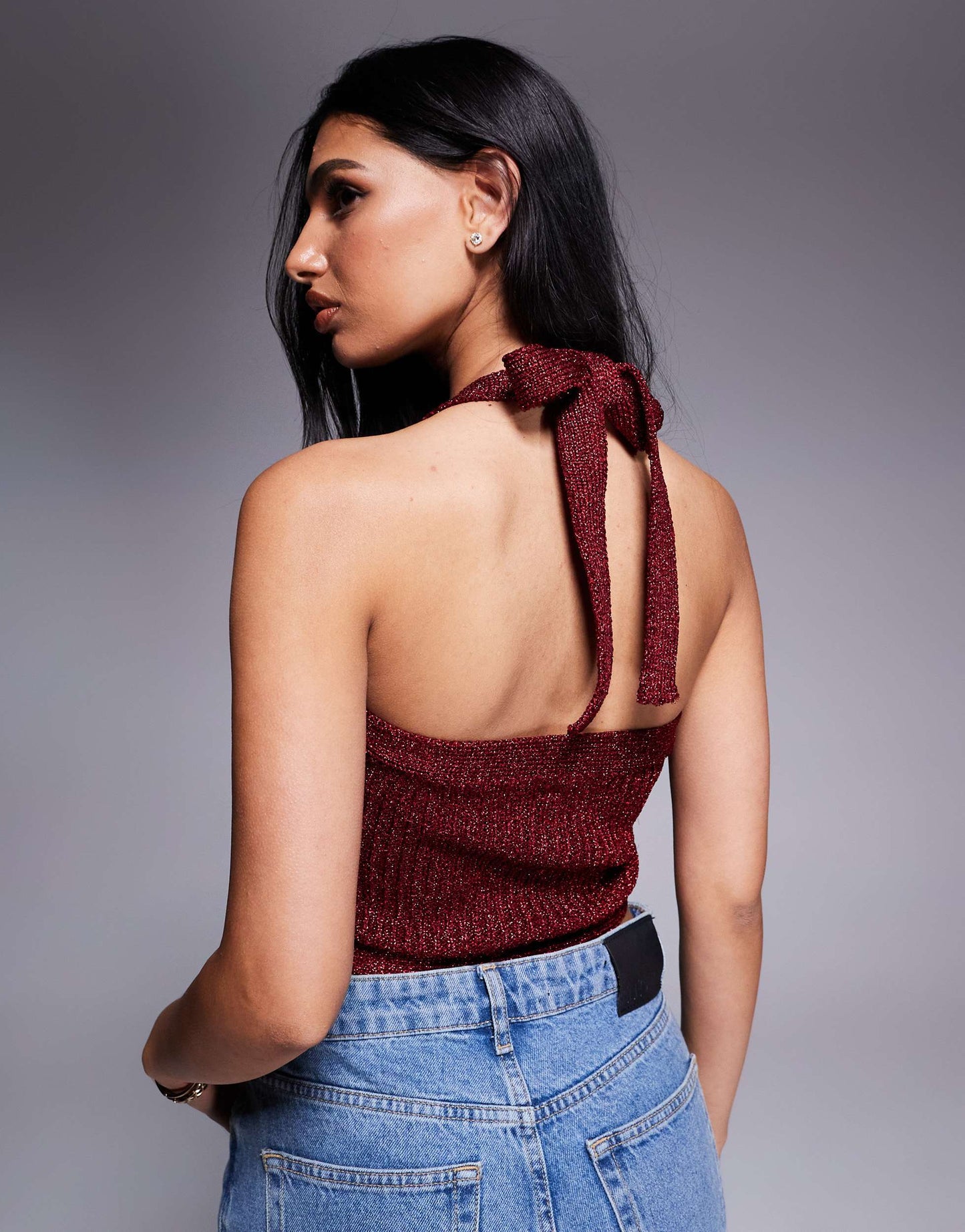 ASOS DESIGN knitted halter crop top in metallic yarn in burgundy