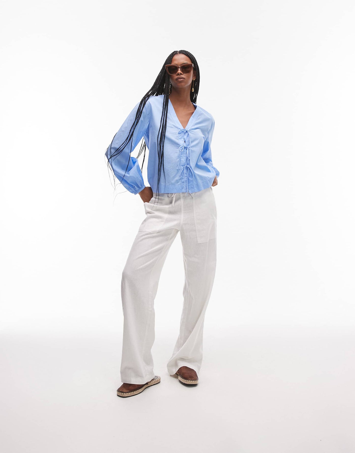 ARKET  v-neck blouse with bow tie front in blue