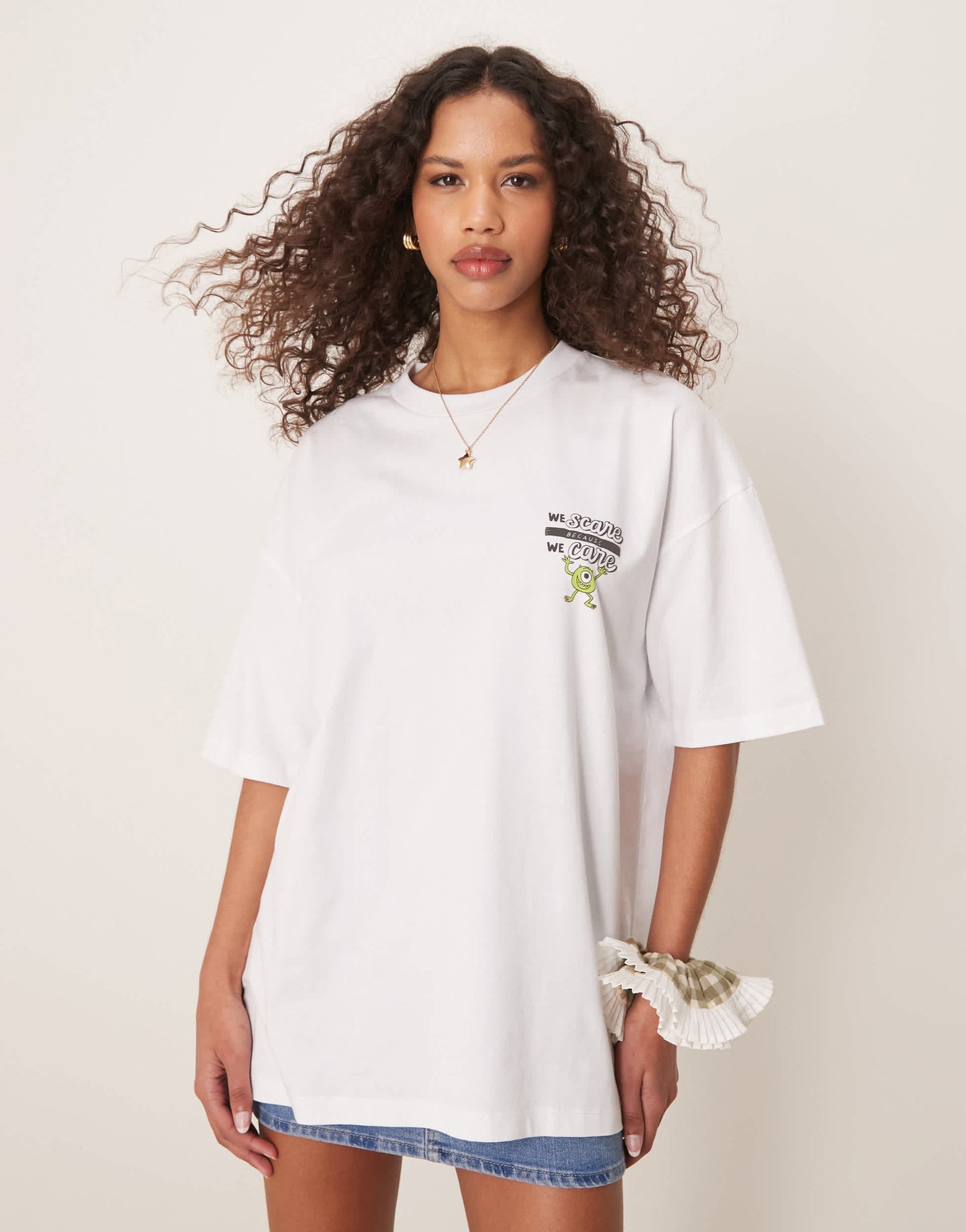 ASOS DESIGN Disney Pixar unisex oversized t-shirt with Monsters Inc prints in white