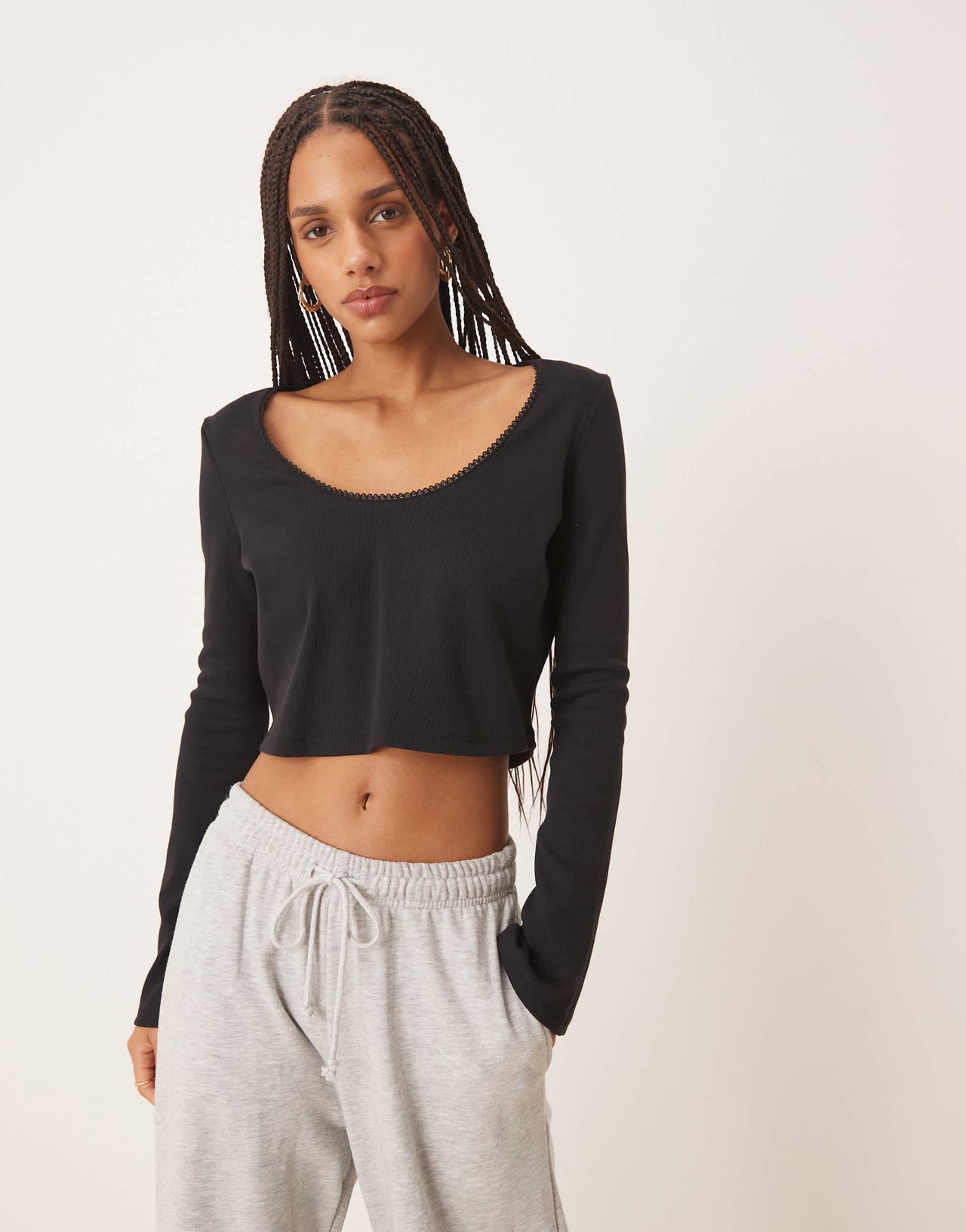 ASOS DESIGN ribbed long sleeve boxy crop top with trim detail in black