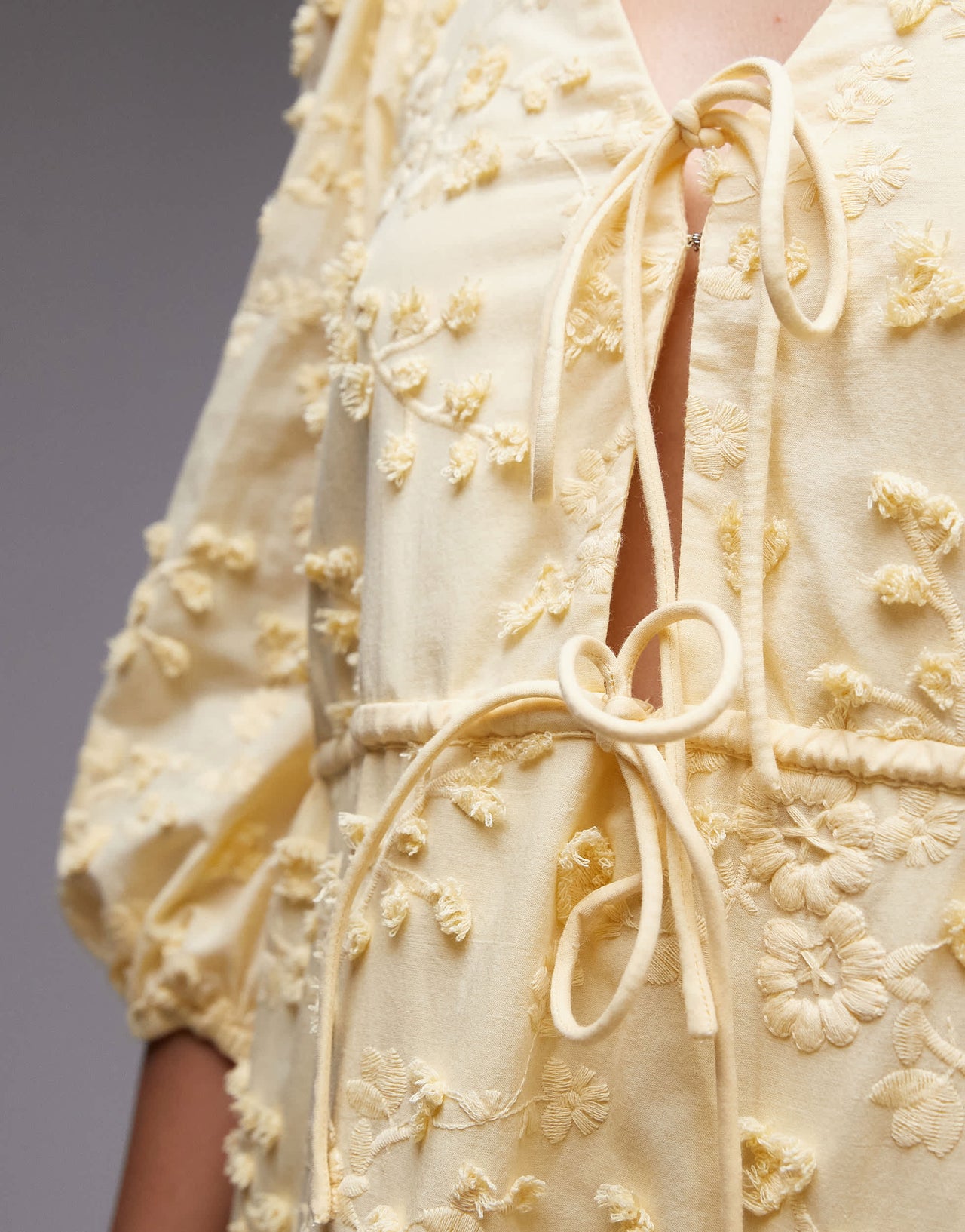 & Other Stories embroidered mini dress with front tie detail and tiered hem in yellow