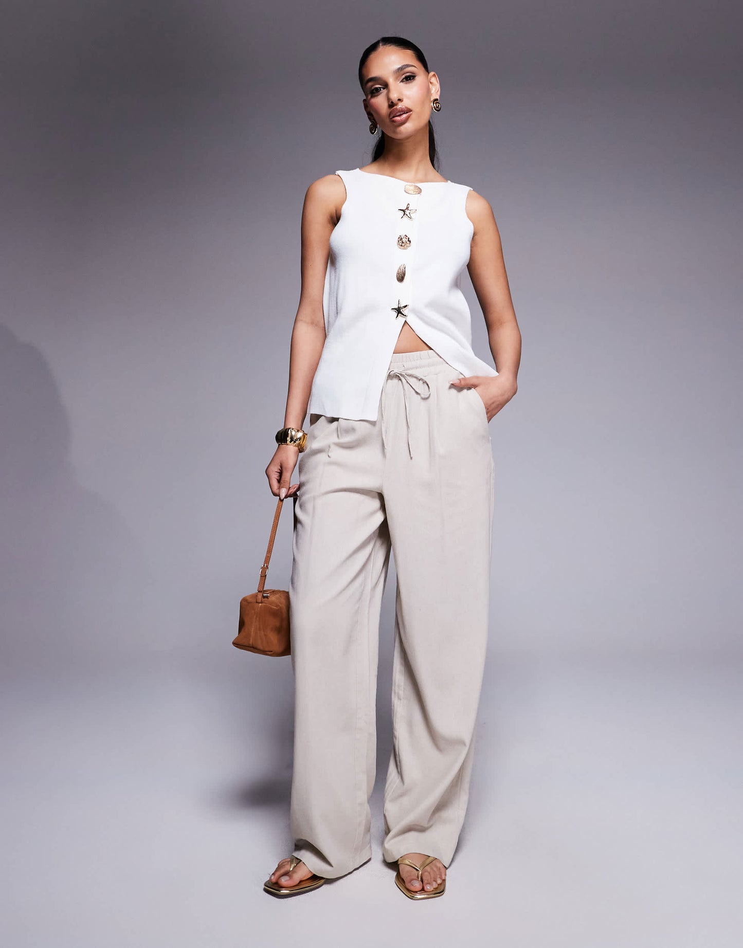 ASOS DESIGN compact knit top with novelty gold buttons in ecru