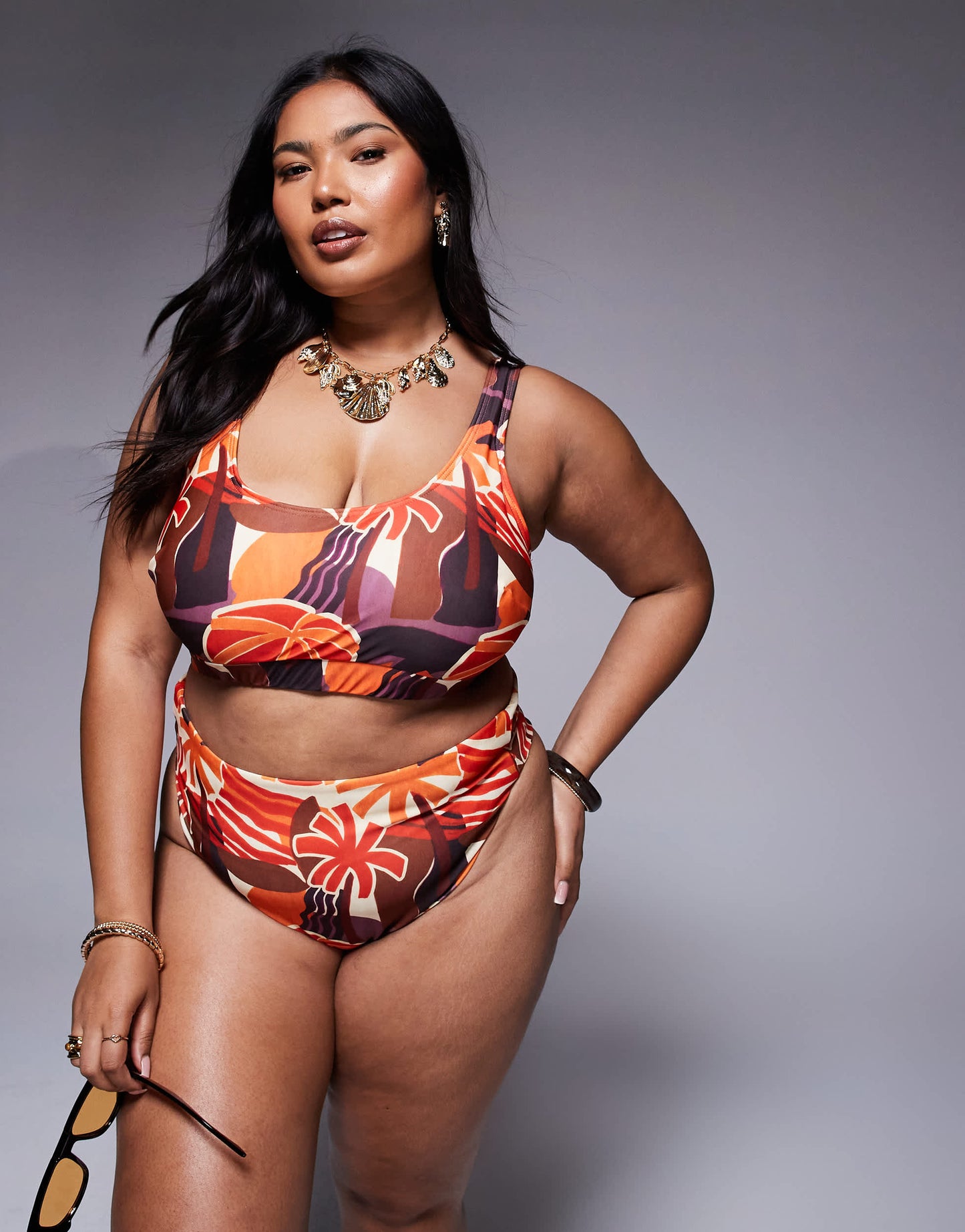 ASOS DESIGN Curve Ava high waist high leg bikini bottom in tropical print