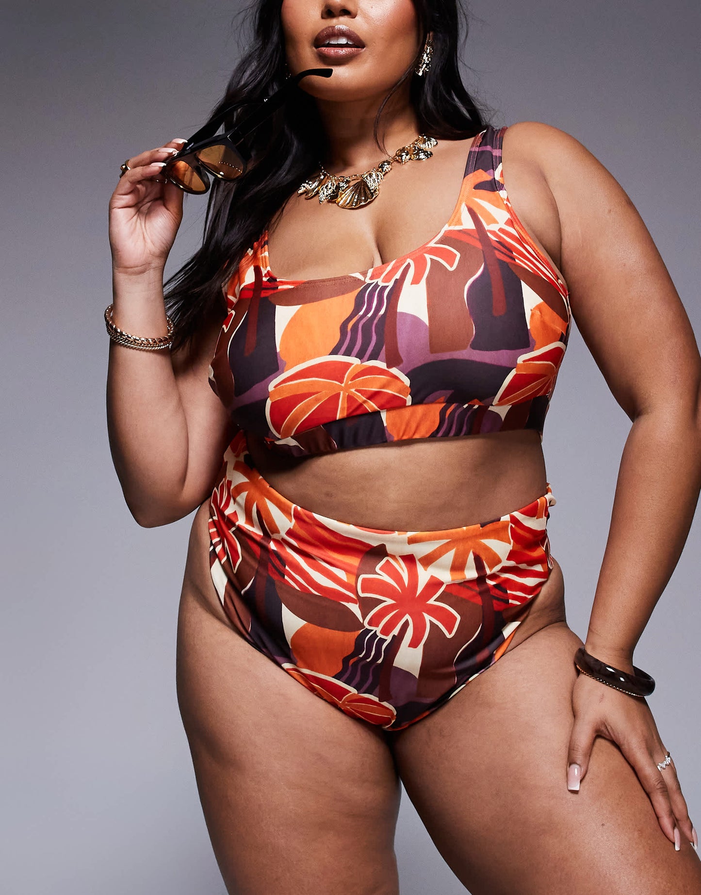 ASOS DESIGN Curve Ava high waist high leg bikini bottom in tropical print