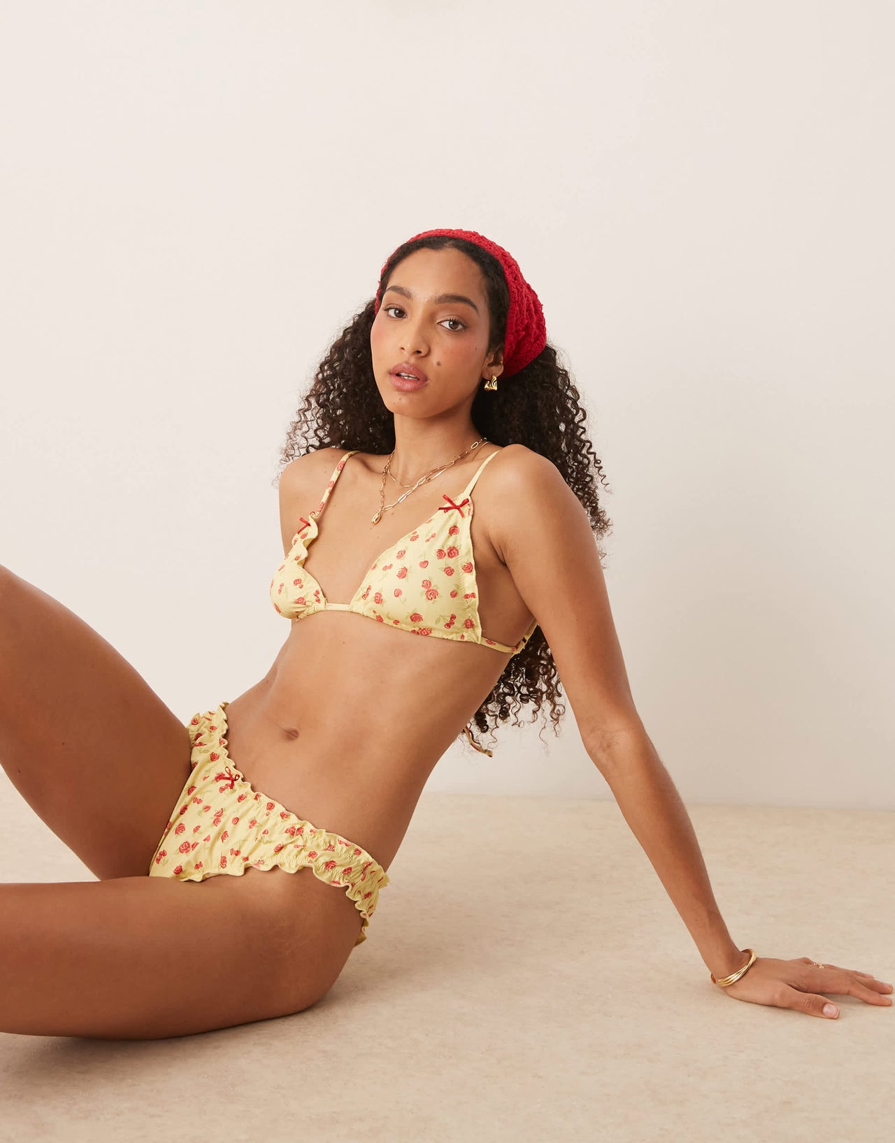 ASOS DESIGN Cherry Rose scrunch cheeky bikini bottom in butter yellow