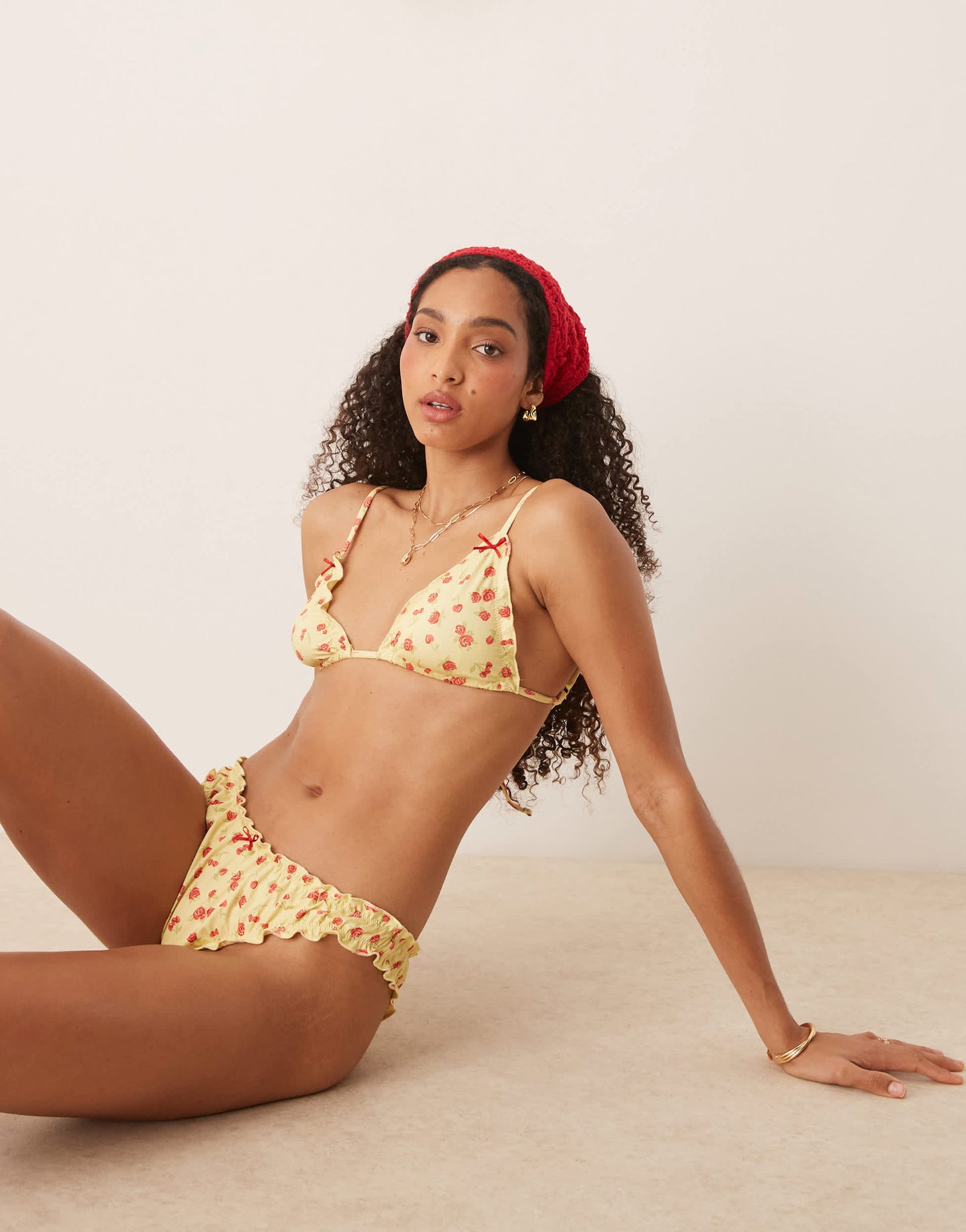 ASOS DESIGN Cherry Rose scrunch cheeky bikini bottom in butter yellow