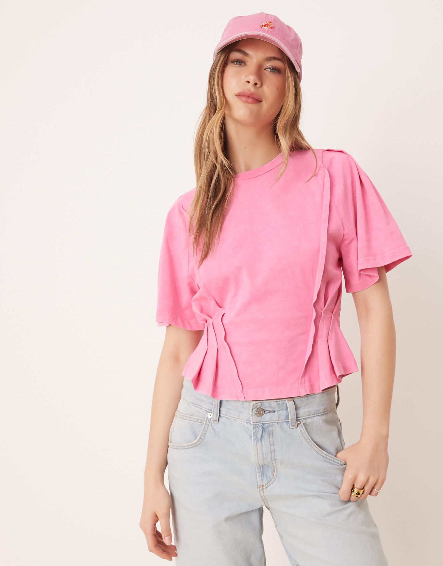 ASOS DESIGN seam detail short sleeve corset waist t-shirt in washed pink