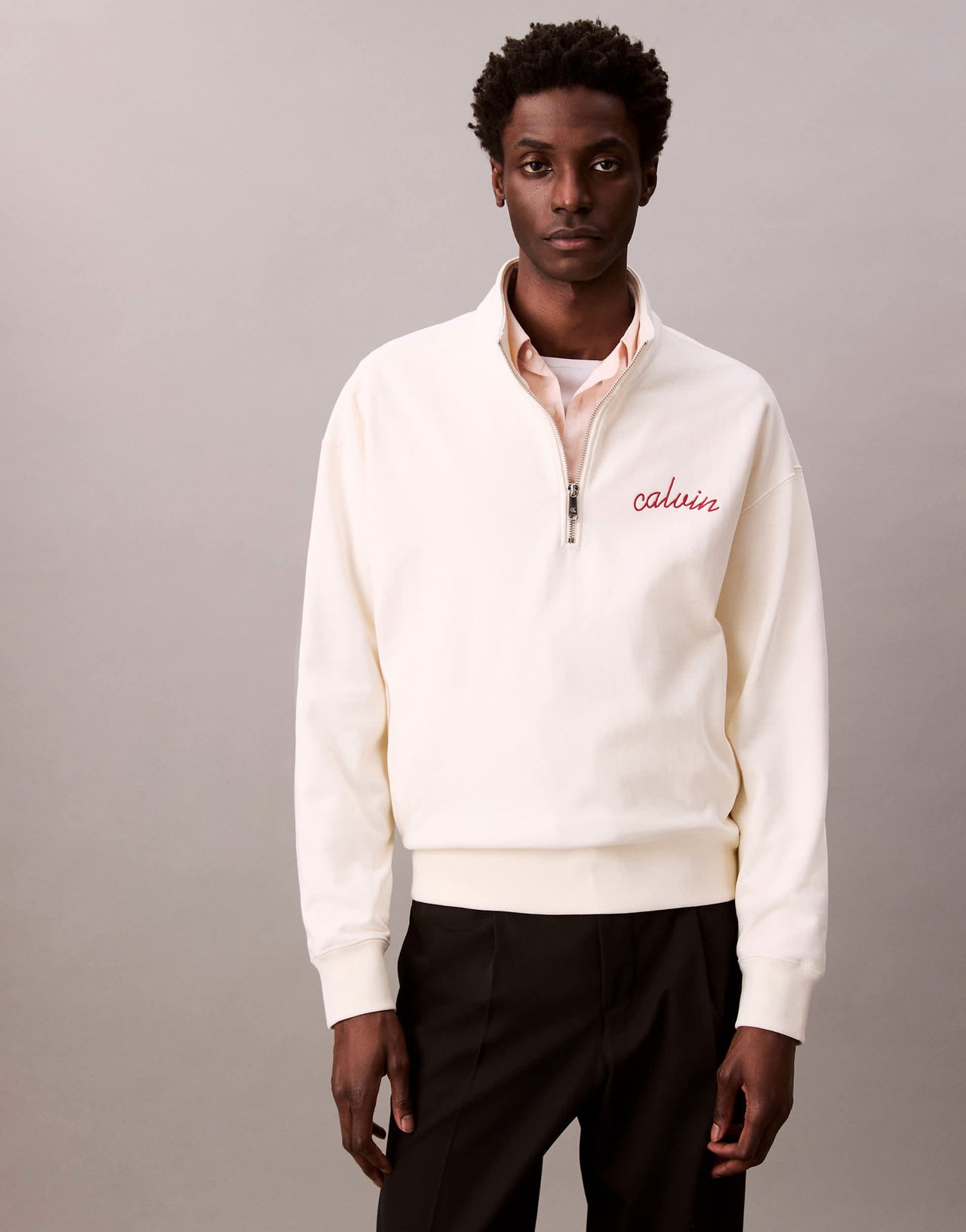Calvin Klein Jeans embroidered chest logo 1/4 zip sweatshirt in off white