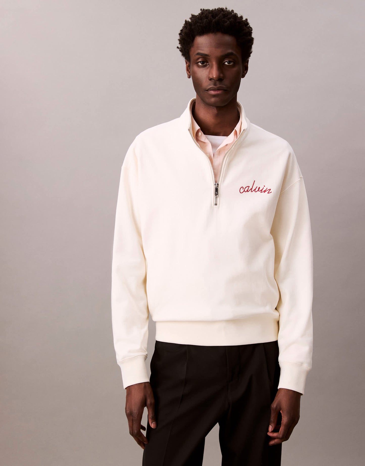 Calvin Klein Jeans embroidered chest logo 1/4 zip sweatshirt in off white