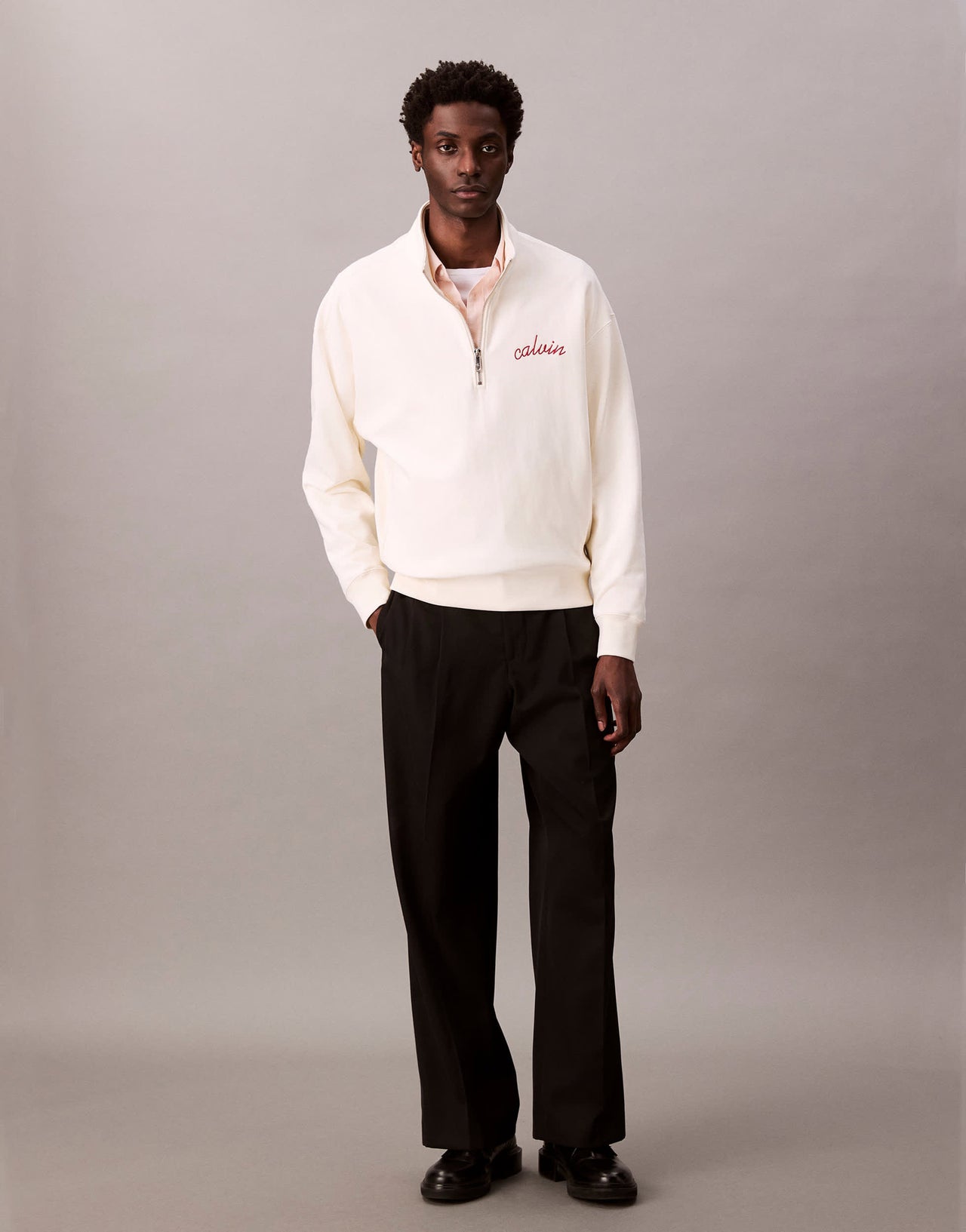 Calvin Klein Jeans embroidered chest logo 1/4 zip sweatshirt in off white
