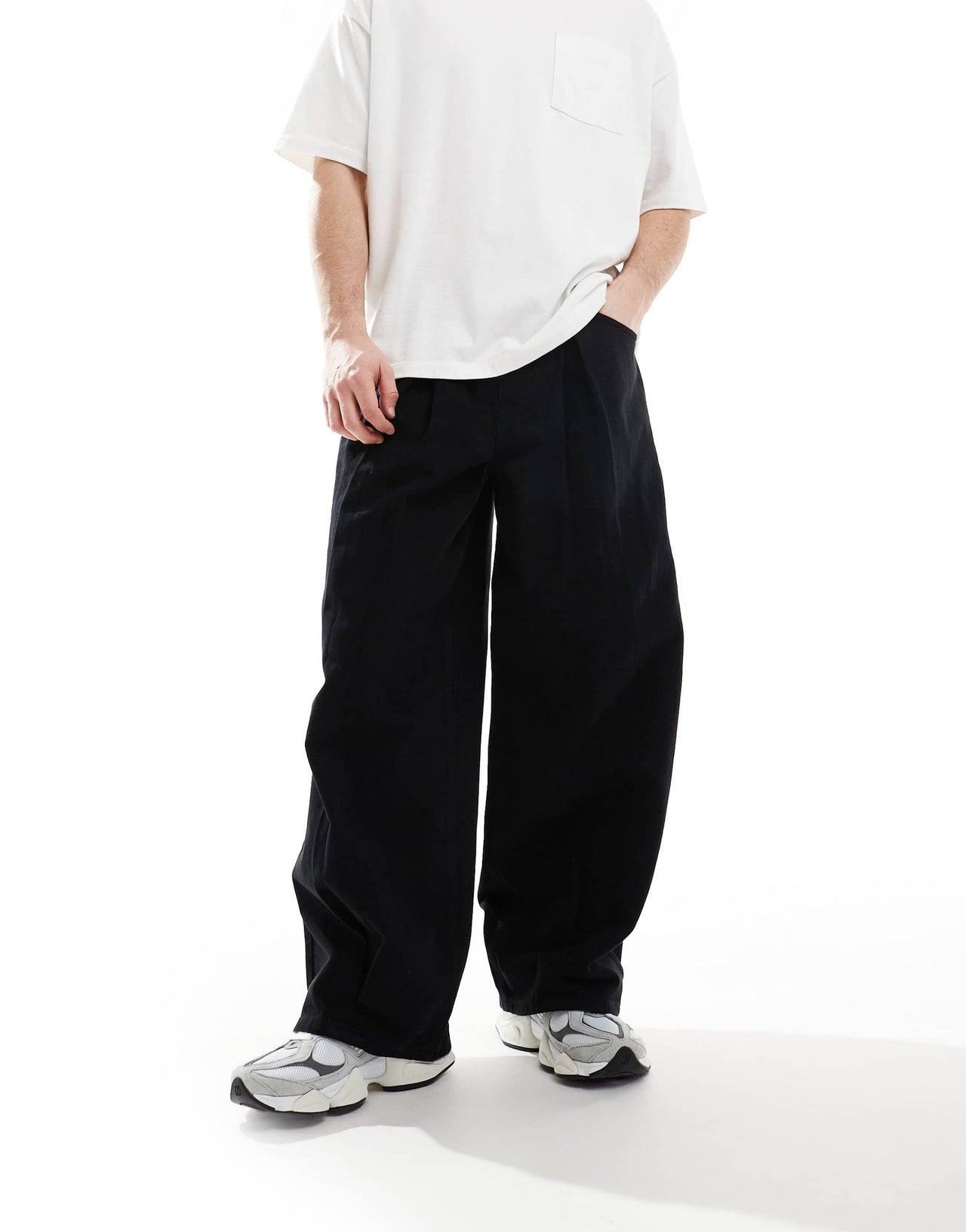 ASOS DESIGN loose trousers in black with pleat detailing