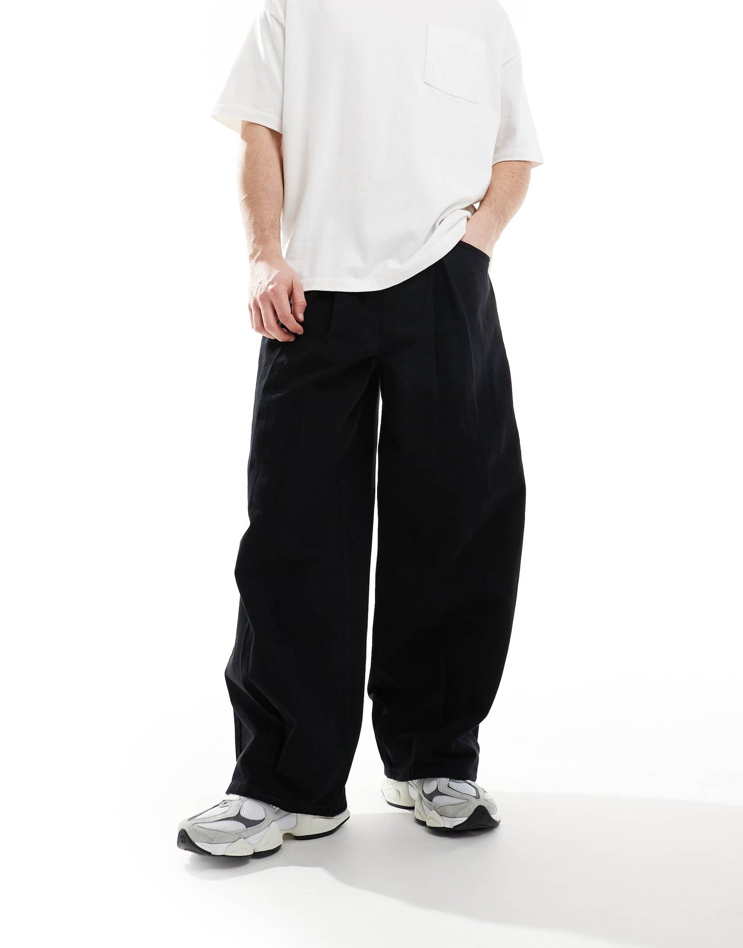 ASOS DESIGN loose trousers in black with pleat detailing