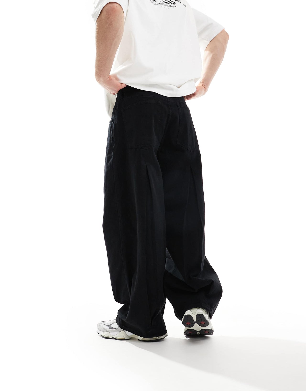 ASOS DESIGN loose trousers in black with pleat detailing