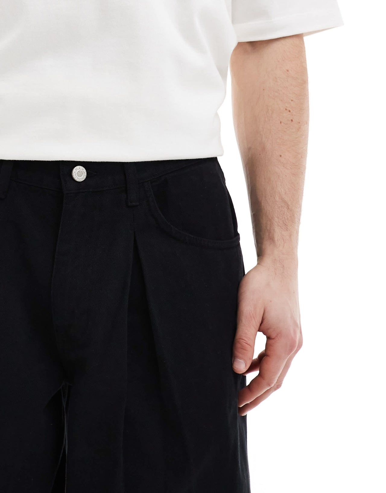 ASOS DESIGN loose trousers in black with pleat detailing