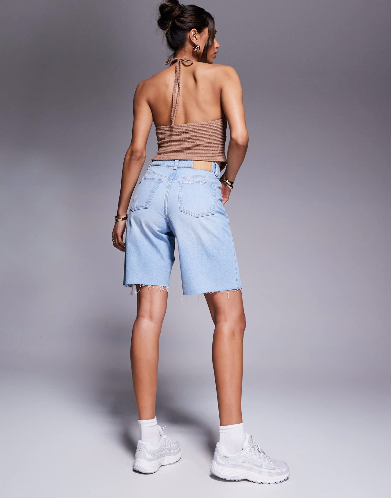 ASOS DESIGN denim bermuda short with rips in pale wash
