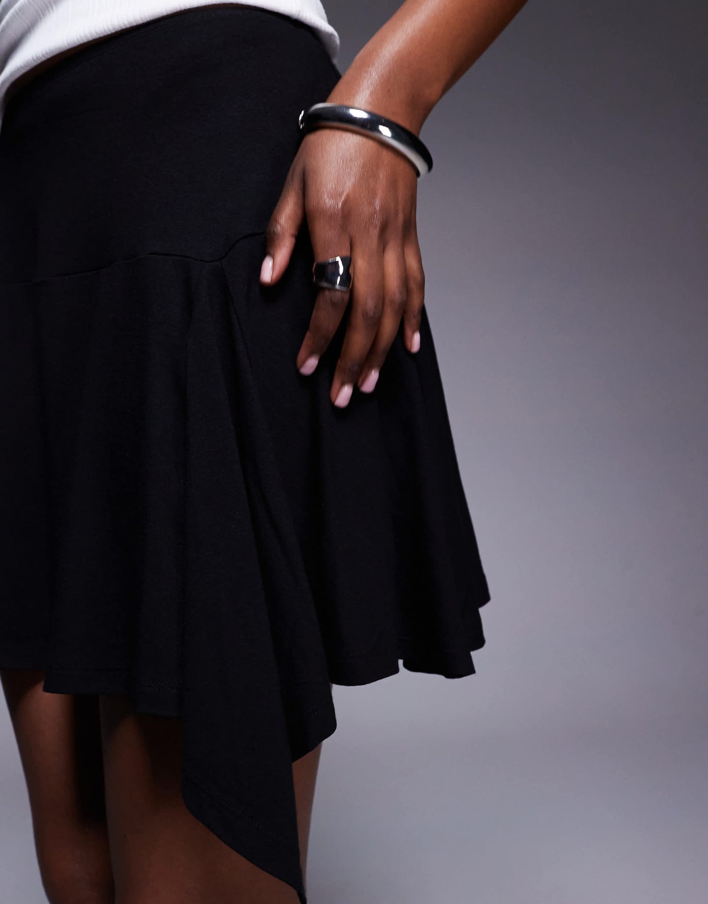 ASOS DESIGN godet detail asymmetric mini skirt in black